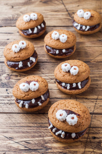 istock Cookies with chocolate paste in the form of monsters for Halloween 1030912294