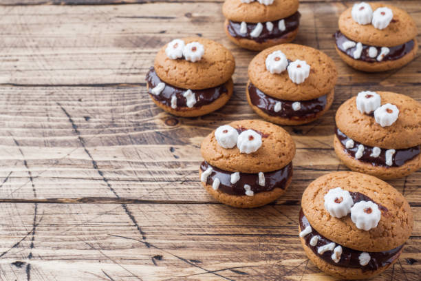 istock Cookies with chocolate paste in the form of monsters for Halloween 1030912384