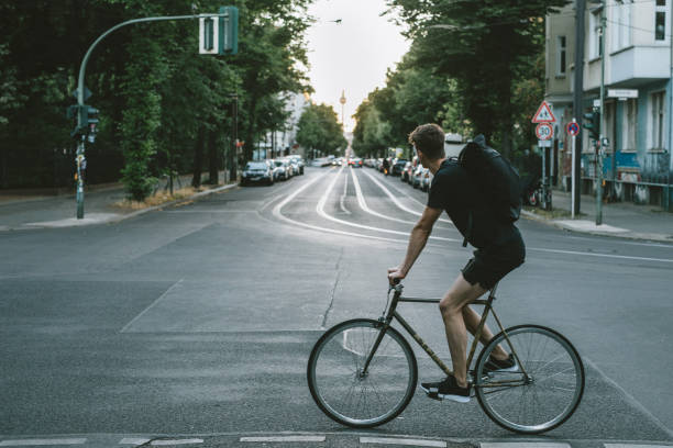 istock Bike courier riding down the street. 1030912772