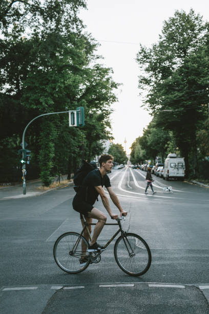 istock Bike courier riding down the street. 1030912784