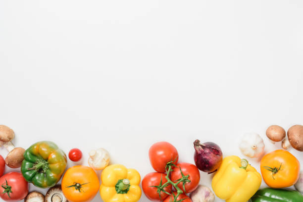 istock top view of ripe appetizing vegetables isolated on white 1030918260
