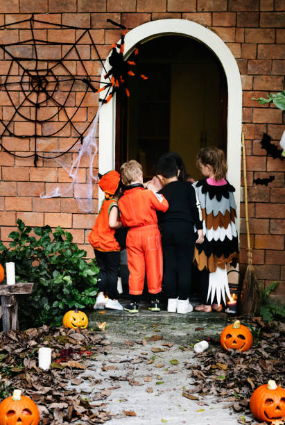 istock Little children trick or treating on Halloween 1030920370
