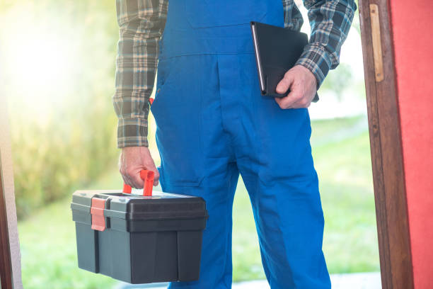 Repairman with toolbox, light effect stock photo