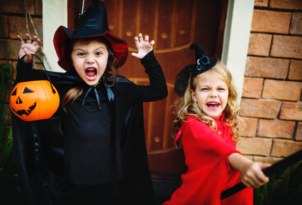 istock Little children trick or treating on Halloween 1030920934