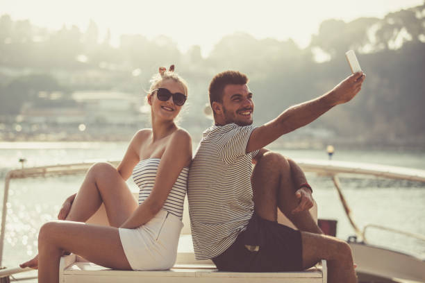 istock Couple taking selfie on vacation 1030926122