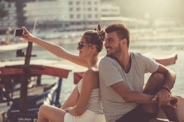 istock Couple taking selfie on vacation 1030926160