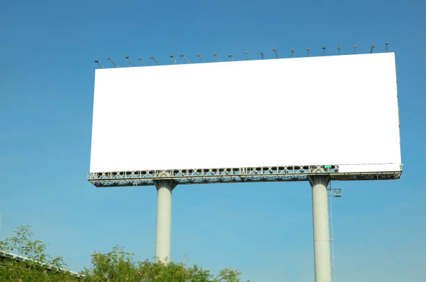 istock Low Angle View Of Billboard Against Clear Blue Sky 1030926288