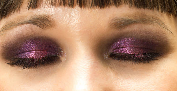 istock eyes makeup closeup with purple smoky eyeshadow 1030930190