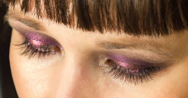 istock eyes makeup closeup with purple smoky eyeshadow 1030930192