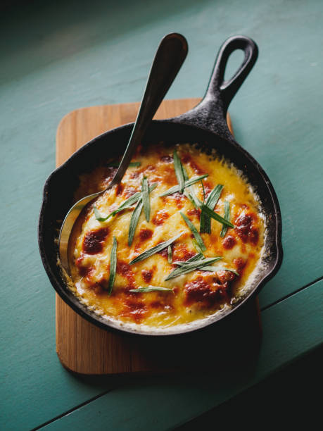 istock high angle view of casserole with eggs and herbs in frying pan 1030930910