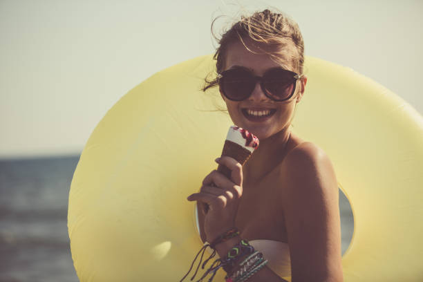 istock Young woman enjoying summertime 1030936564