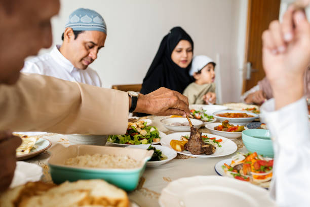 istock Muslim family having a Ramadan feast 1030940356