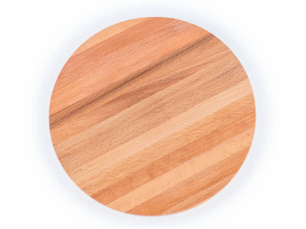 istock Round wooden cutting board isolated with clipping path 1030944096