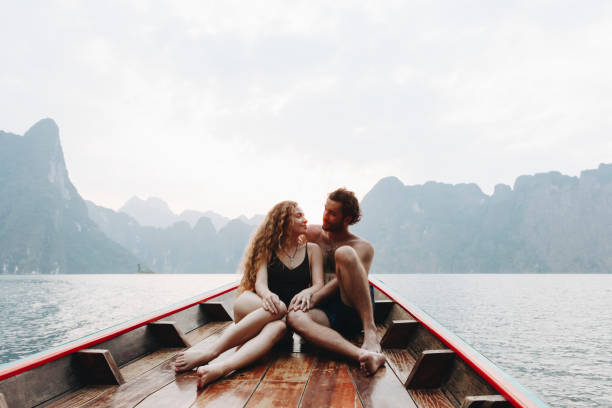 istock Couple boating on a quiet lake 1030944474