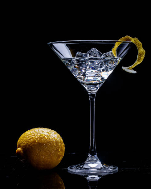 istock lemon and glass with martinion black background 1030945030