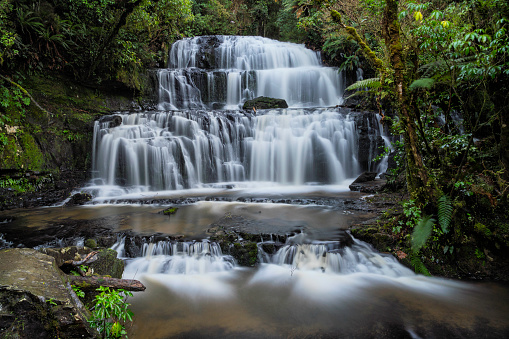 The spectacular Puraukaunui Waterfalls in the Catlins, Southland New Zealand.
