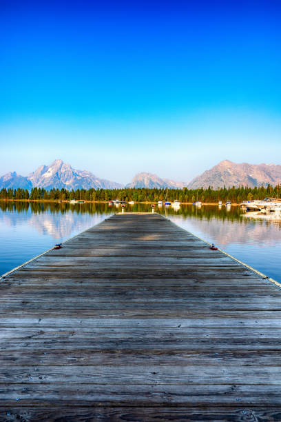 A dock along the shore of Jackson Lake, Wyoming, located in Grand Teton National Park.