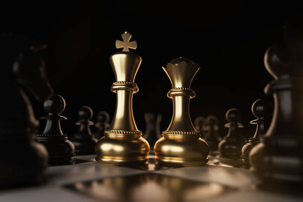 Golden King and Queen Chess piece Concept for business competition and strategy. Golden King and Queen Chess piece Concept for business competition and strategy, 3d rendering. king chess piece stock pictures, royalty-free photos & images