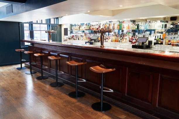 istock Interior Of Empty Bar With Stools And Counter 1030952654