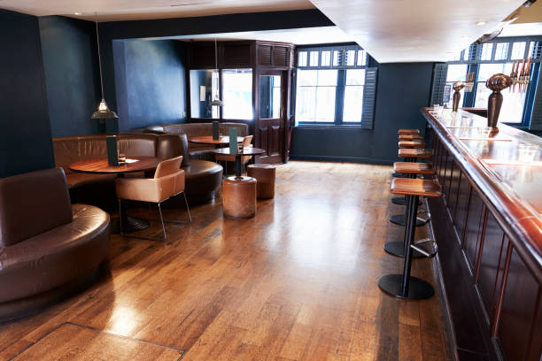 istock Interior Of Empty Bar With Stools And Counter 1030952694