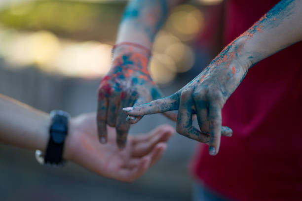 Hands colored with powder colors for holi indian festival