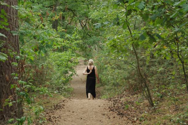 istock Woman walking in the heath 1030953538