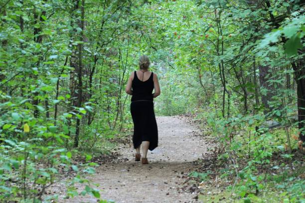 istock Woman walking in the heath 1030953570