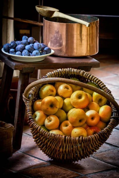 istock Fresh Polish apples in the basket and plums on a plate 1030961064