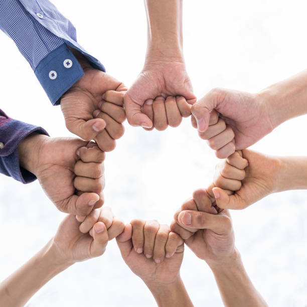 istock Stack of fist hands business success,harmonious,congraturation ,team work concept. 1030969288