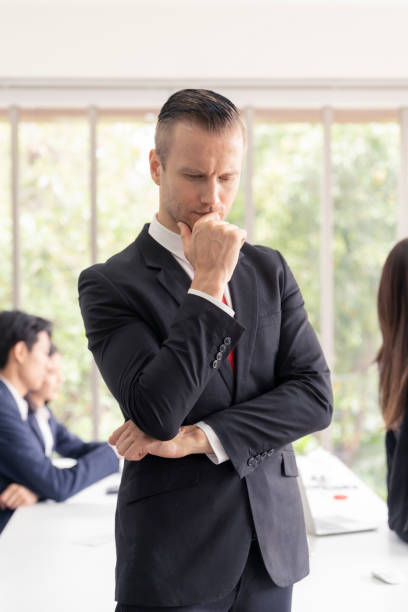 istock Business man thinking about business plan in office. 1030969494