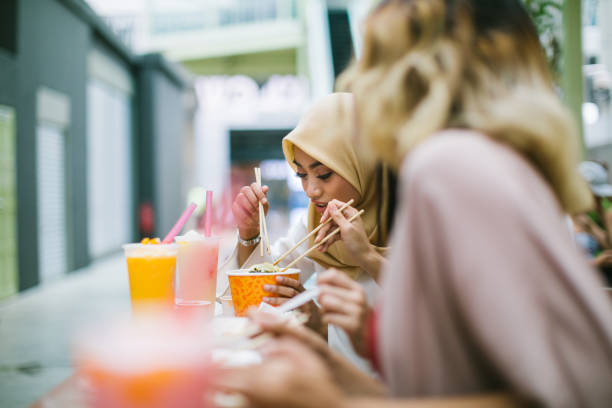 istock Friends having fun at a lunch break 1030973162