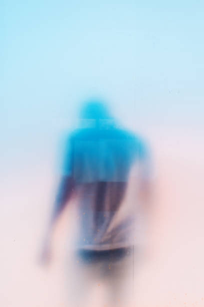 istock Silhouette of unrecognizable sad depressed masculine man 1030973268