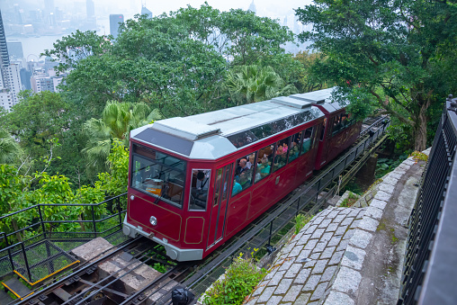 Hong Kong - May 4,2018 : Tourist tram at the peak, Victoria peak tram and Hong Kong city skyline, Hong Kong, China.