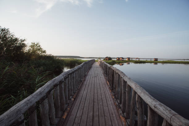 istock beautiful wooden bridge river 1030985846