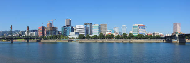 istock Portland Skyline - Willamette River - Oregon 1030988636