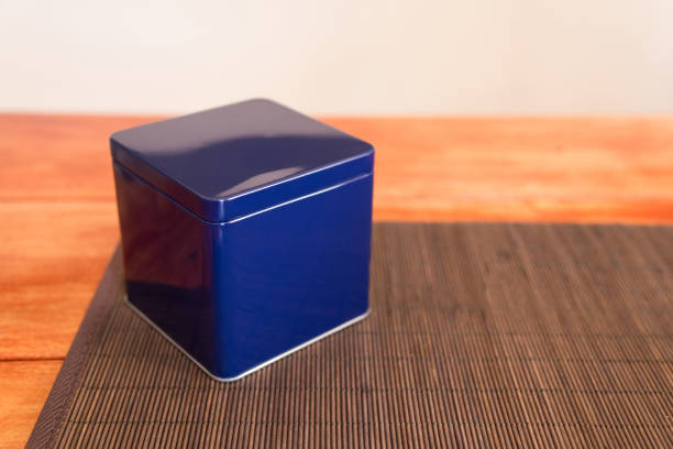 Blue metal box on a bamboo  napkin