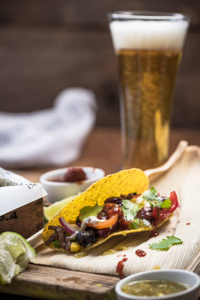 istock Tacos served with beer glass 1030989582