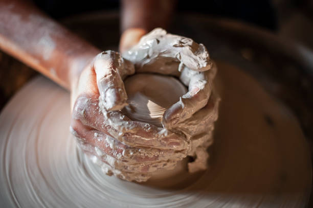 istock Young artist working on a potter ’s wheel 1030989784
