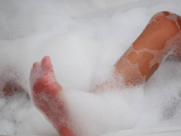 istock bubble foam Bath feet wash 1030992758