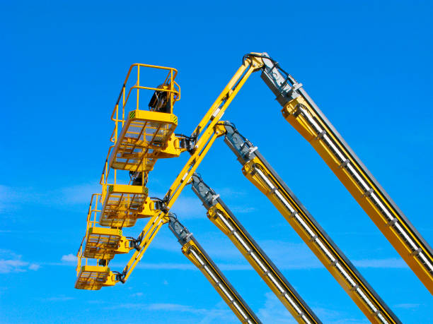 istock Aerial lifting platforms in the sky 1030995772