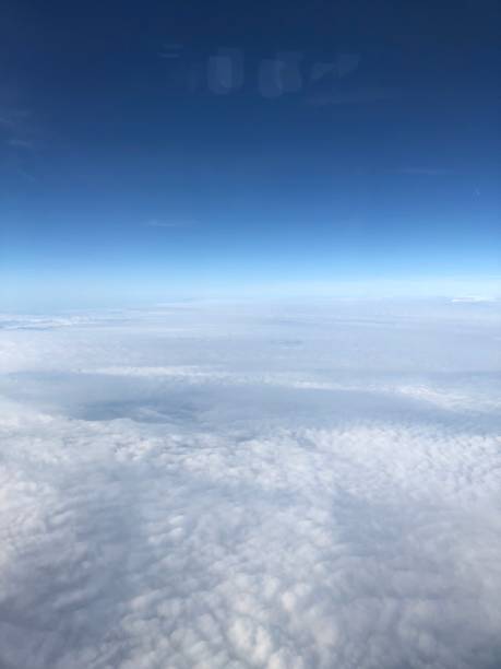 istock sunset horizon seen from an airplane window above indonesia 1031022438