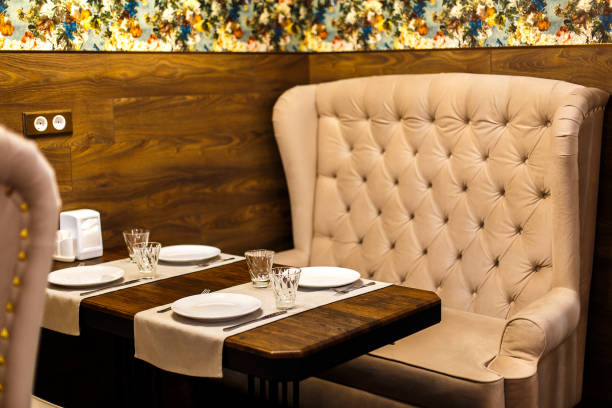 istock chairs and sofas in a cafe on the table of glasses 1031027794