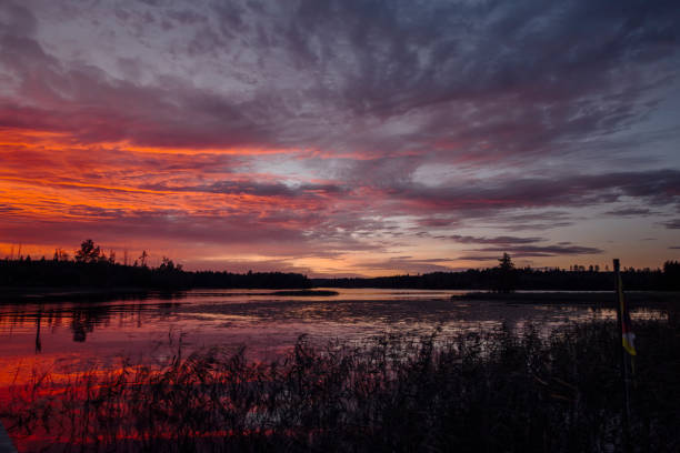 istock Bright red sunset over the lake in Karelia 1031033578