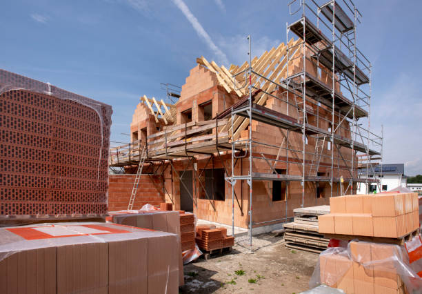 construction site of an new built house - construction material material brick building activity imagens e fotografias de stock
