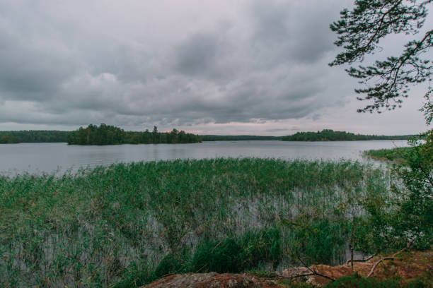 istock rainy weather, clouds over the lake 1031037740