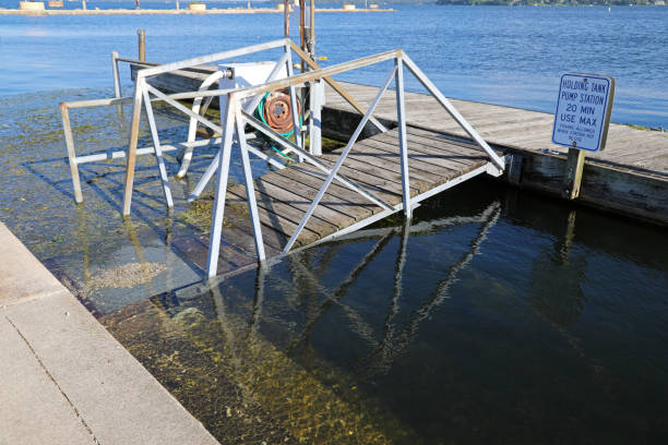 istock Flooded holding tank and pier in Wisconsin upper Midwest 1031049934
