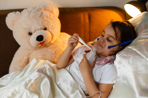 istock Child holds a mask vapor inhaler 1031066240