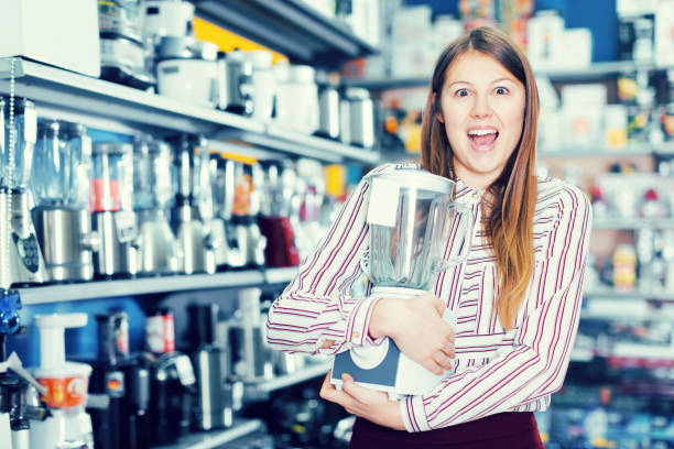istock buyer in delight from new devices in store 1031091110