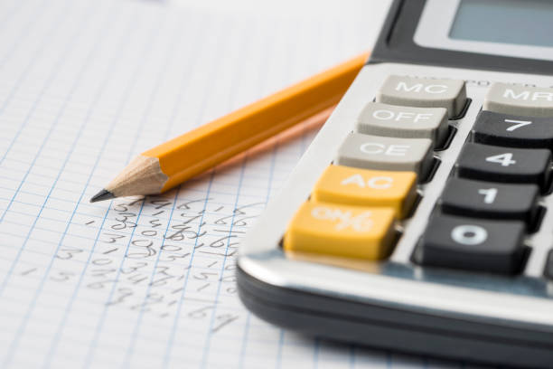 istock calculator on top of some financial data 1031099796