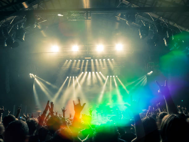 istock Filming concert on smart phone 1031124140